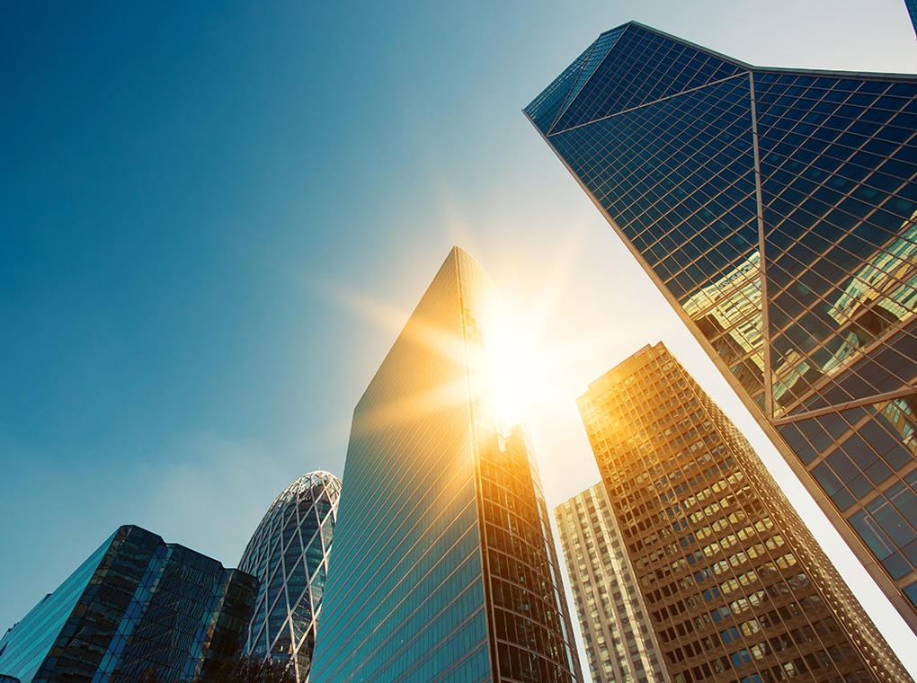 skyscraper,glass,facades,on,a,bright,sunny,day,with,sunbeams