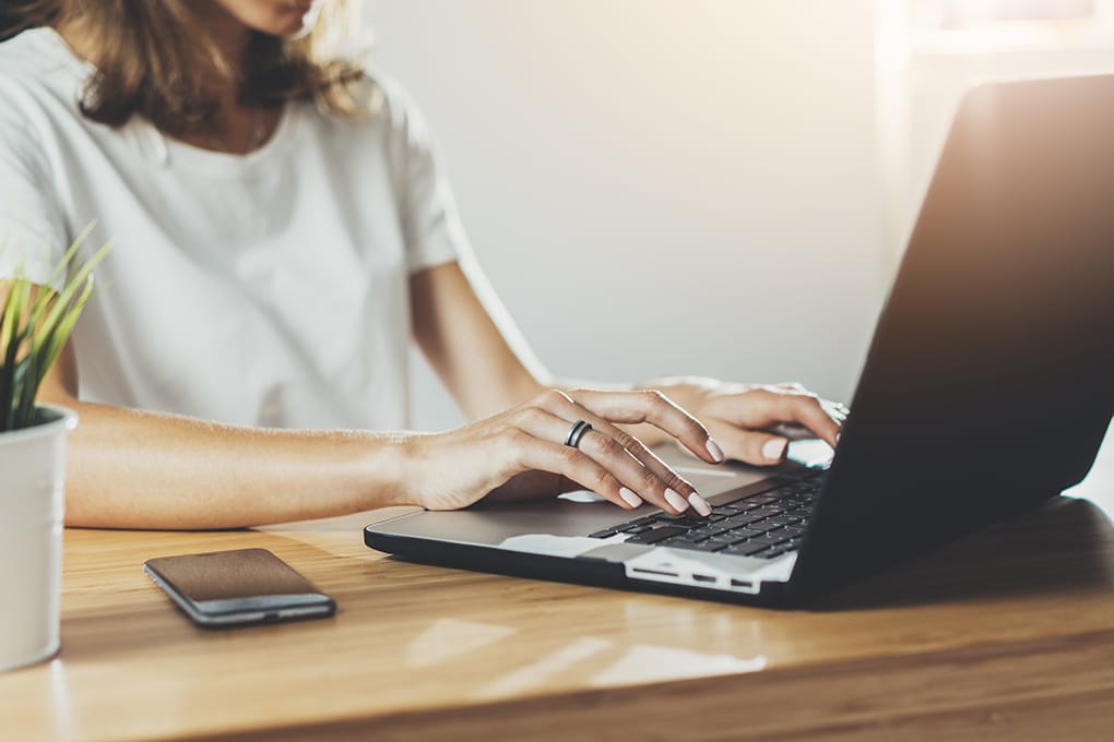 cropped,image,of,professional,businesswoman,working,at,her,office,via