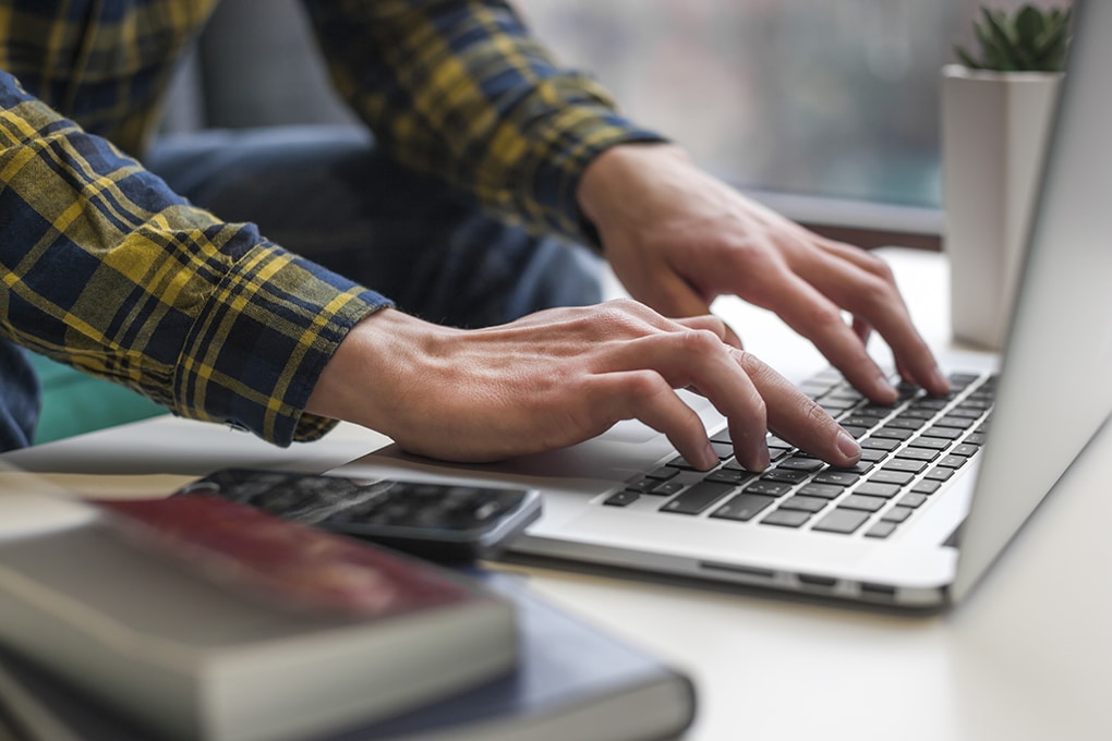 man,hands,working,on,laptop