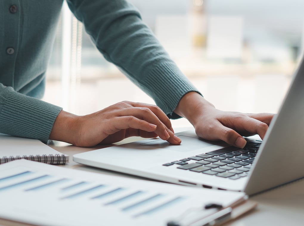 business,woman,working,and,typing,on,laptop,computer,on,the