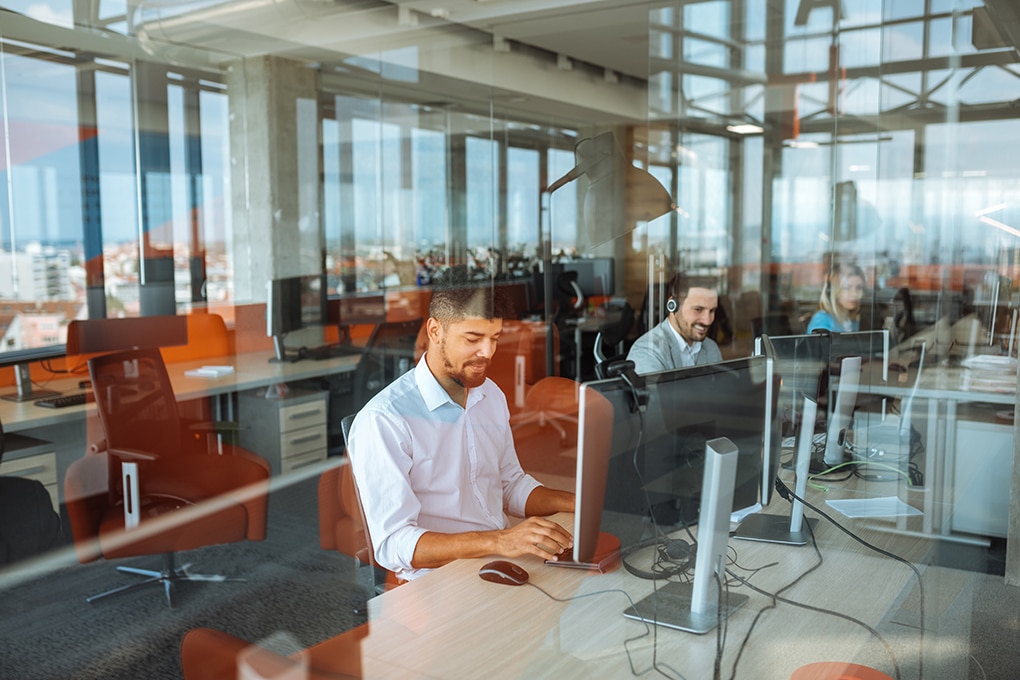 shot,of,a,man,working,in,an,office