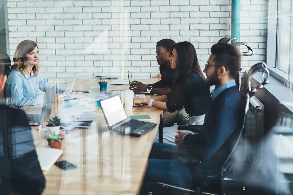 young,male,and,female,partners,teamworking,togetherness,in,workspace,while