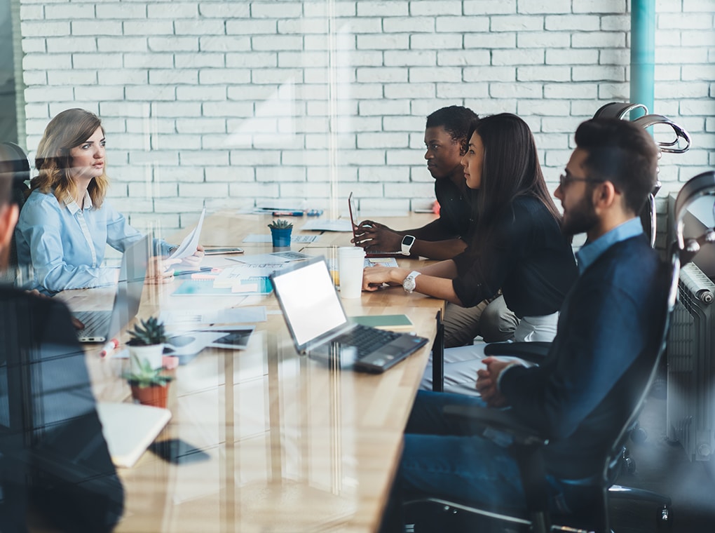 young,male,and,female,partners,teamworking,togetherness,in,workspace,while