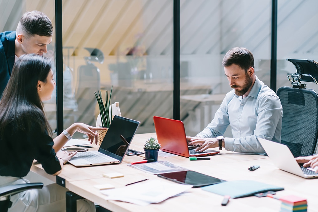 group,of,focused,serious,busy,male,and,female,colleagues,dressed