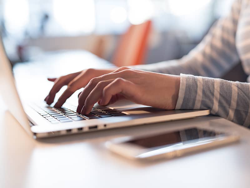 A person working using a laptop